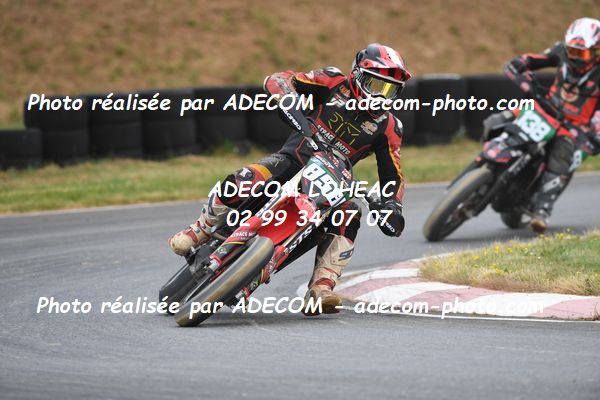 http://v2.adecom-photo.com/images//8.MOTO/2023/10_SUPERMOTARD_LOHEAC_2023/S2/BAZOT_Gregory/41A_6301.JPG